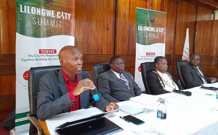 Briefing the media about Lilongwe City Summit